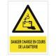 Panneau danger charge en cours de la batterie W026